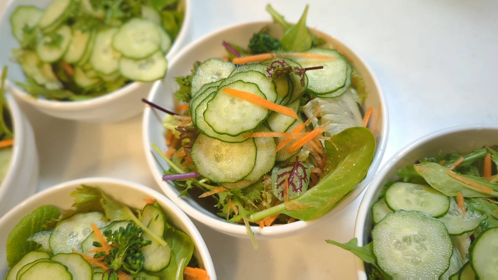 Making a salad with harvested vegetables